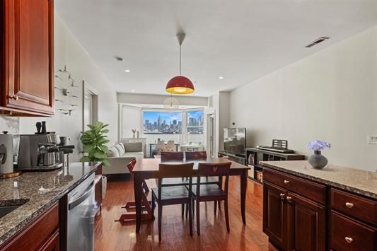 Dining room, Interior, Kitchen, Living room, Pendant Lights, Recessed Lighting, Stainless Steel Appliances, Wood Texture Flooring