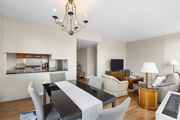 Chandelier, Dining room, Interior, Kitchen, Living room, Stainless Steel Appliances, Wood Texture Flooring