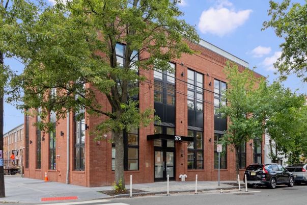 Exterior, Facade, Brick Facade, Condo Building