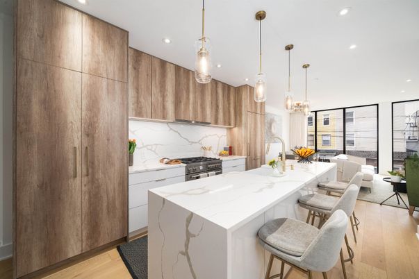 Interior, Kitchen, Marble Walls, Pendant Lights, Recessed Lighting, Stainless Steel Appliances, Wood Texture Flooring
