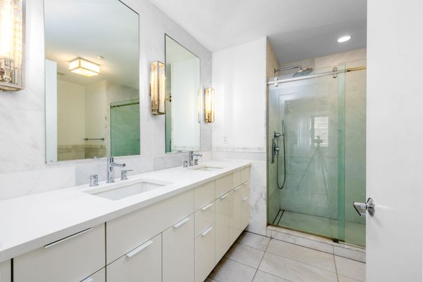 Bathroom, Dual Sink Vanities, Glass Shower, Interior, Marble Walls, Recessed Lighting