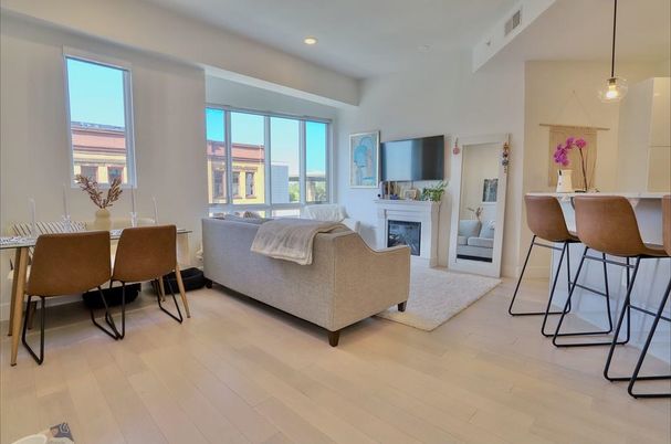 Dining room, Fireplace, Interior, Living room, Pendant Lights, Recessed Lighting, Wood Texture Flooring