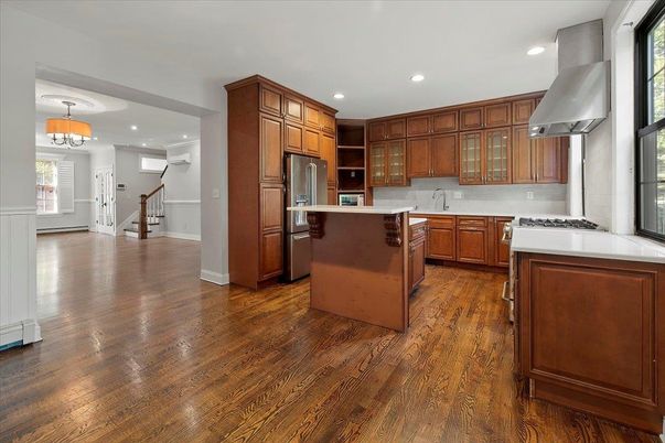 Chandelier, Interior, Kitchen, Pendant Lights, Recessed Lighting, Stainless Steel Appliances, Wood Texture Flooring