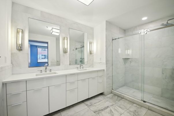 Bathroom, Dual Sink Vanities, Glass Shower, Interior, Marble, Marble Walls, Recessed Lighting