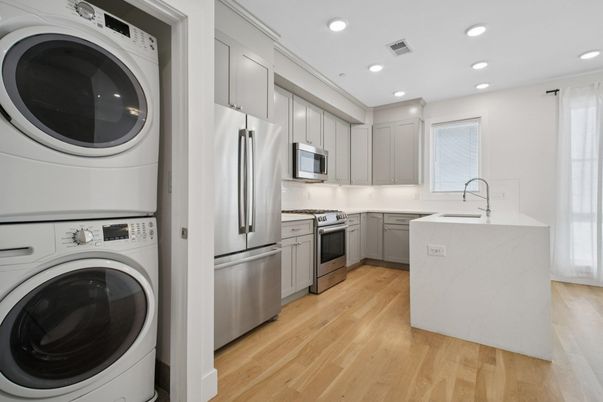 Interior, Kitchen, Recessed Lighting, Stainless Steel Appliances, Washer, Wood Texture Flooring