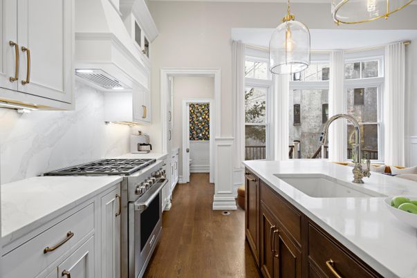 Interior, Kitchen, Marble Walls, Pendant Lights, Stainless Steel Appliances, Wood Texture Flooring