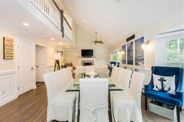 Dining room, Fireplace, Interior, Living room, Recessed Lighting, Wood Texture Flooring