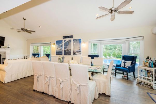 Dining room, Fireplace, Interior, Living room, Recessed Lighting, Wood Texture Flooring