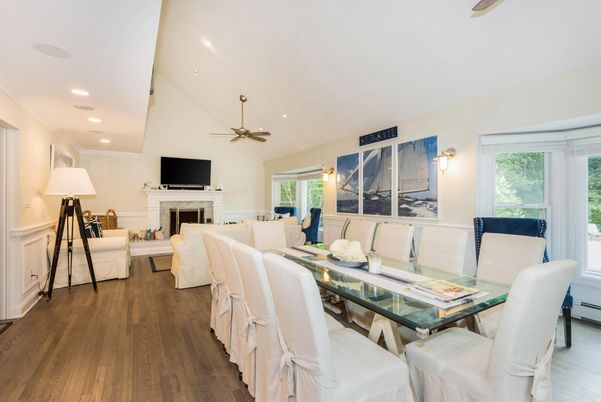 Dining room, Fireplace, Interior, Living room, Recessed Lighting, Wood Texture Flooring