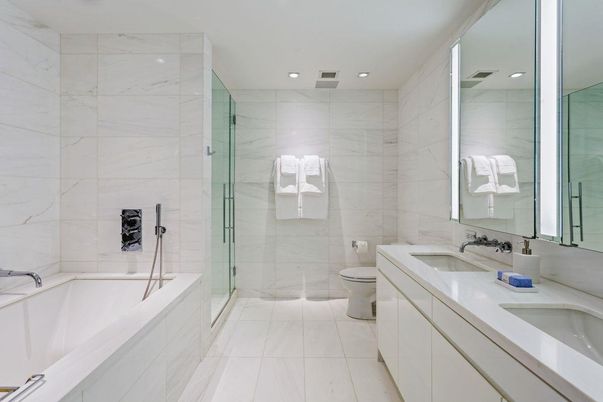Bathroom, Dual Sink Vanities, Glass Shower, Interior, Marble Walls, Recessed Lighting