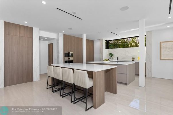 Interior, Kitchen, Marble Walls, Recessed Lighting, Stainless Steel Appliances