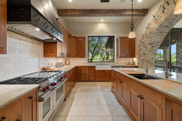 Interior, Kitchen, Pendant Lights, Recessed Lighting, Stainless Steel Appliances, Stone Walls, Wooden Beams