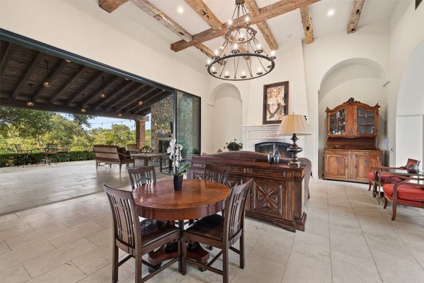 Chandelier, Dining room, Fireplace, Interior, Pendant Lights, Recessed Lighting, Wooden Beams