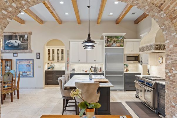 Interior, Kitchen, Pendant Lights, Recessed Lighting, Stainless Steel Appliances, Stone Walls, Wooden Beams