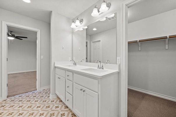 Bathroom, Dual Sink Vanities, Interior, Recessed Lighting, Walk-in Closets