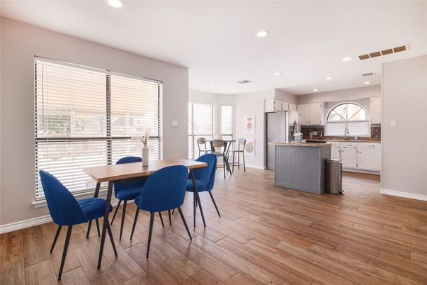 Dining room, Interior, Kitchen, Recessed Lighting, Stainless Steel Appliances, Wood Texture Flooring