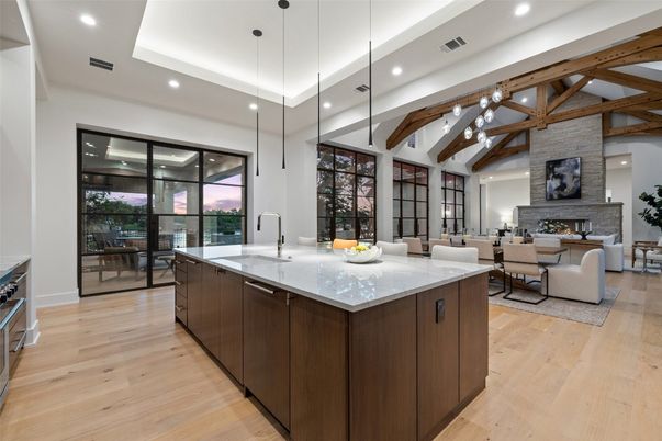 Dining room, Fireplace, Interior, Kitchen, Living room, Pendant Lights, Recessed Lighting, Stone Walls, Wooden Beams, Wood Texture Flooring