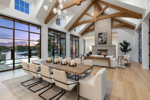 Dining room, Fireplace, Interior, Living room, Pendant Lights, Recessed Lighting, Water, Wooden Beams, Wood Texture Flooring