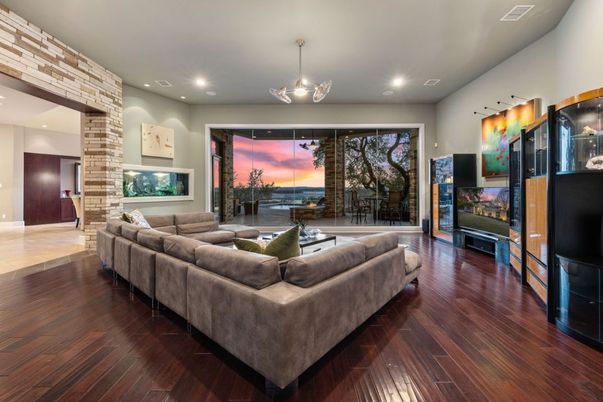 Fireplace, Interior, Living room, Pendant Lights, Recessed Lighting, Stone Walls, Wood Texture Flooring