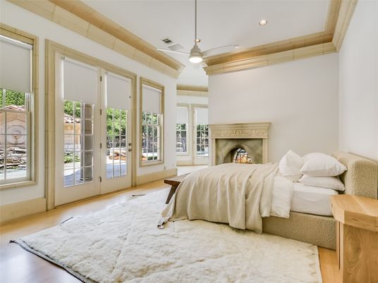 Bedroom, Fireplace, Interior, Pendant Lights, Recessed Lighting, Wood Texture Flooring