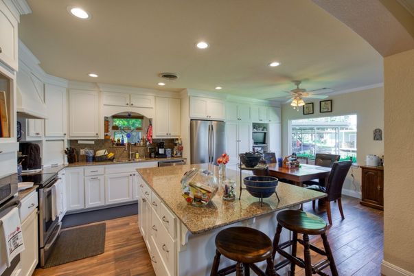 Dining room, Interior, Kitchen, Recessed Lighting, Stainless Steel Appliances, Wood Texture Flooring