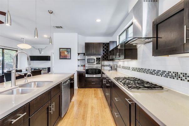 Interior, Kitchen, Pendant Lights, Recessed Lighting, Stainless Steel Appliances, Wood Texture Flooring