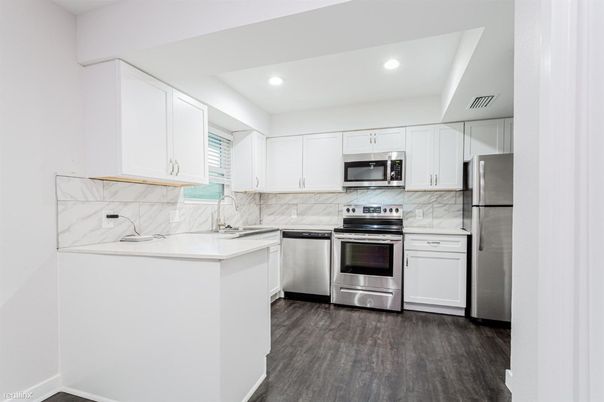 Interior, Kitchen, Marble Walls, Recessed Lighting, Stainless Steel Appliances, Wood Texture Flooring
