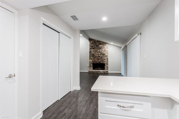 Fireplace, Interior, Recessed Lighting, Stone Walls, Wood Texture Flooring