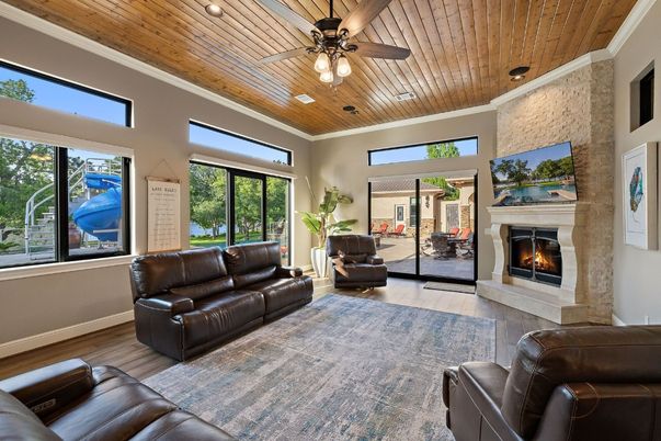 Fireplace, Interior, Living room, Recessed Lighting, Stone Walls, Wooden Ceilings, Wood Texture Flooring