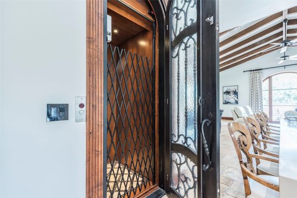 Elevator, Interior, Recessed Lighting, Wooden Ceilings, Wooden Walls