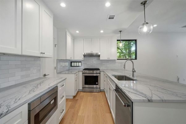 Interior, Kitchen, Pendant Lights, Recessed Lighting, Stainless Steel Appliances, Wood Texture Flooring