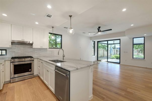 Interior, Kitchen, Pendant Lights, Recessed Lighting, Stainless Steel Appliances, Wood Texture Flooring