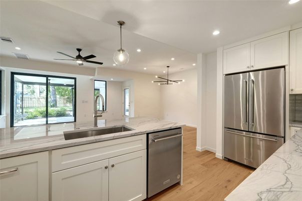 Interior, Kitchen, Pendant Lights, Recessed Lighting, Stainless Steel Appliances, Wood Texture Flooring