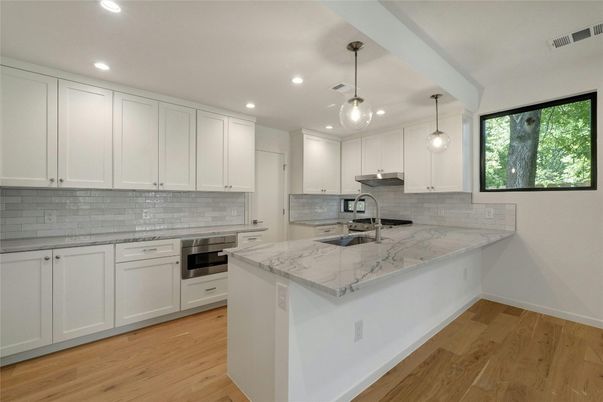 Interior, Kitchen, Pendant Lights, Recessed Lighting, Stainless Steel Appliances, Wood Texture Flooring