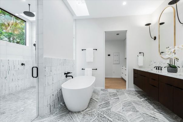 Bathroom, Dual Sink Vanities, Free Standing Baths, Glass Shower, Interior, Marble, Recessed Lighting, Wood Texture Flooring