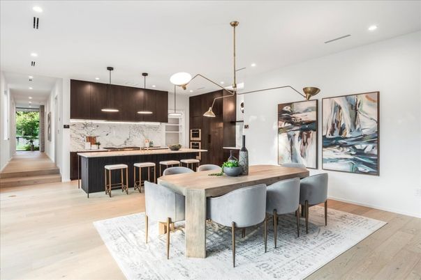 Dining room, Interior, Kitchen, Marble Walls, Pendant Lights, Recessed Lighting, Stainless Steel Appliances, Wood Texture Flooring