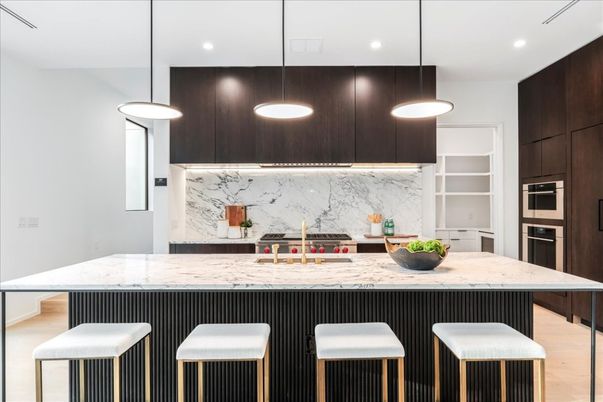 Interior, Kitchen, Marble Walls, Pendant Lights, Recessed Lighting, Stainless Steel Appliances