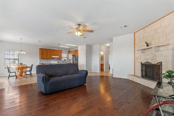 Dining room, Fireplace, Interior, Kitchen, Living room, Pendant Lights, Recessed Lighting, Stone Walls, Wood Texture Flooring