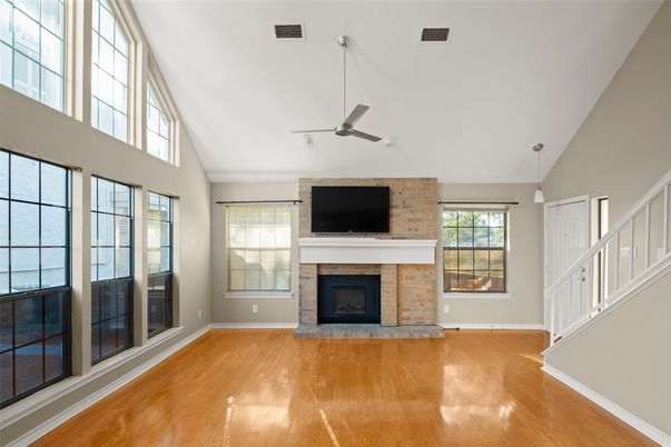 Empty room, Fireplace, Interior, Pendant Lights, Stone Walls, Wood Texture Flooring