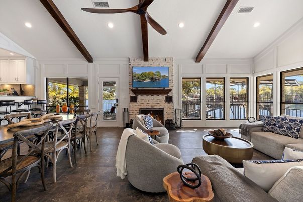 Dining room, Fireplace, Interior, Living room, Recessed Lighting, Stone Walls, Wooden Beams