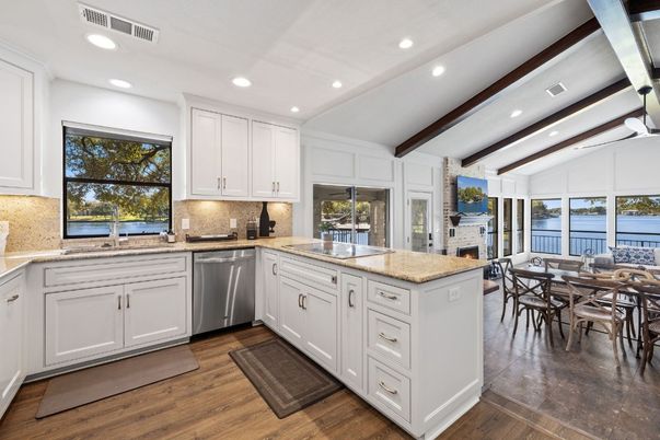 Dining room, Fireplace, Interior, Kitchen, Recessed Lighting, Stainless Steel Appliances, Wood Texture Flooring