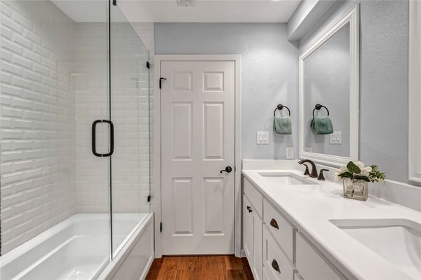 Bathroom, Dual Sink Vanities, Glass Shower, Interior, Wood Texture Flooring