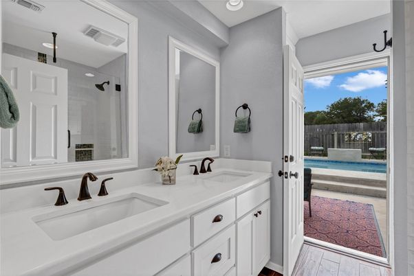 Bathroom, Dual Sink Vanities, Interior, Recessed Lighting, Wood Texture Flooring