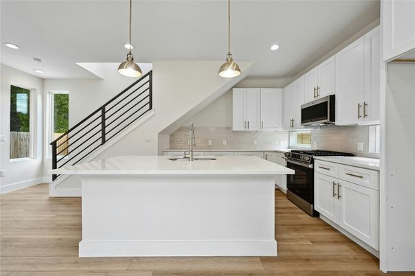 Interior, Kitchen, Pendant Lights, Recessed Lighting, Stainless Steel Appliances, Wood Texture Flooring