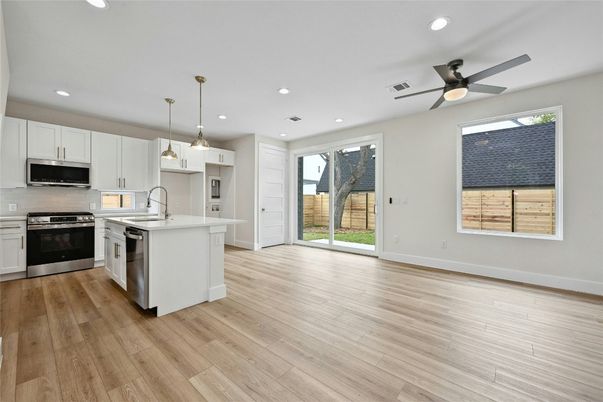 Interior, Kitchen, Pendant Lights, Recessed Lighting, Stainless Steel Appliances, Wood Texture Flooring