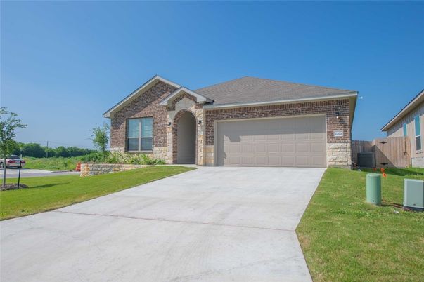 Attached, Exterior, Facade, Brick Facade, Brick Traditional