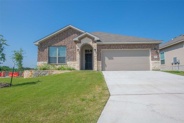 Attached, Exterior, Facade, Brick Facade, Brick Traditional