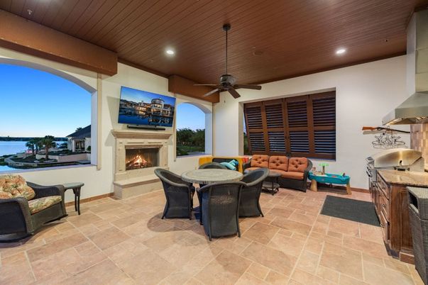 Fireplace, Interior, Living room, Recessed Lighting, Water, Wooden Ceilings