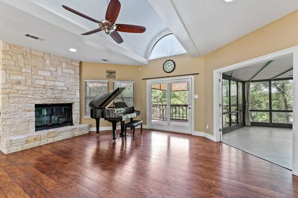 Fireplace, Interior, Piano, Recessed Lighting, Stone Walls, Wood Texture Flooring