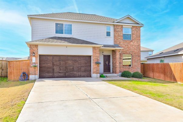 Attached, Exterior, Facade, Brick Facade, Modern
